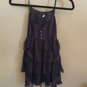 Sheer spaghetti top blouse.